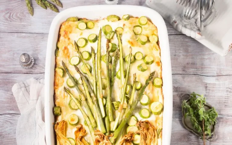 A vibrant casserole dish featuring fresh asparagus.