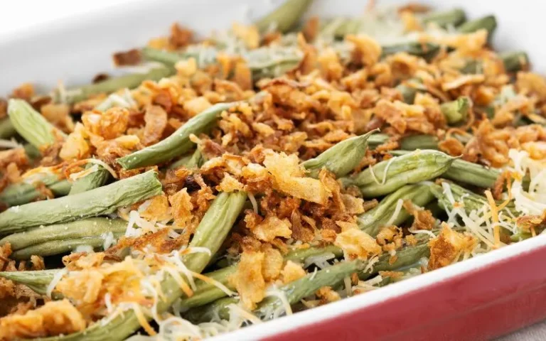 A delicious green bean casserole topped with crispy onions.