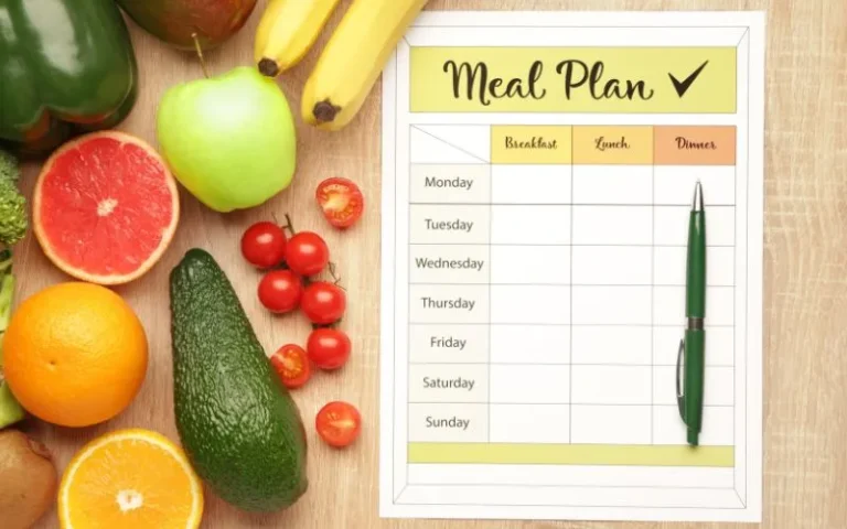 A structured weekly meal plan illustrated on a whiteboard