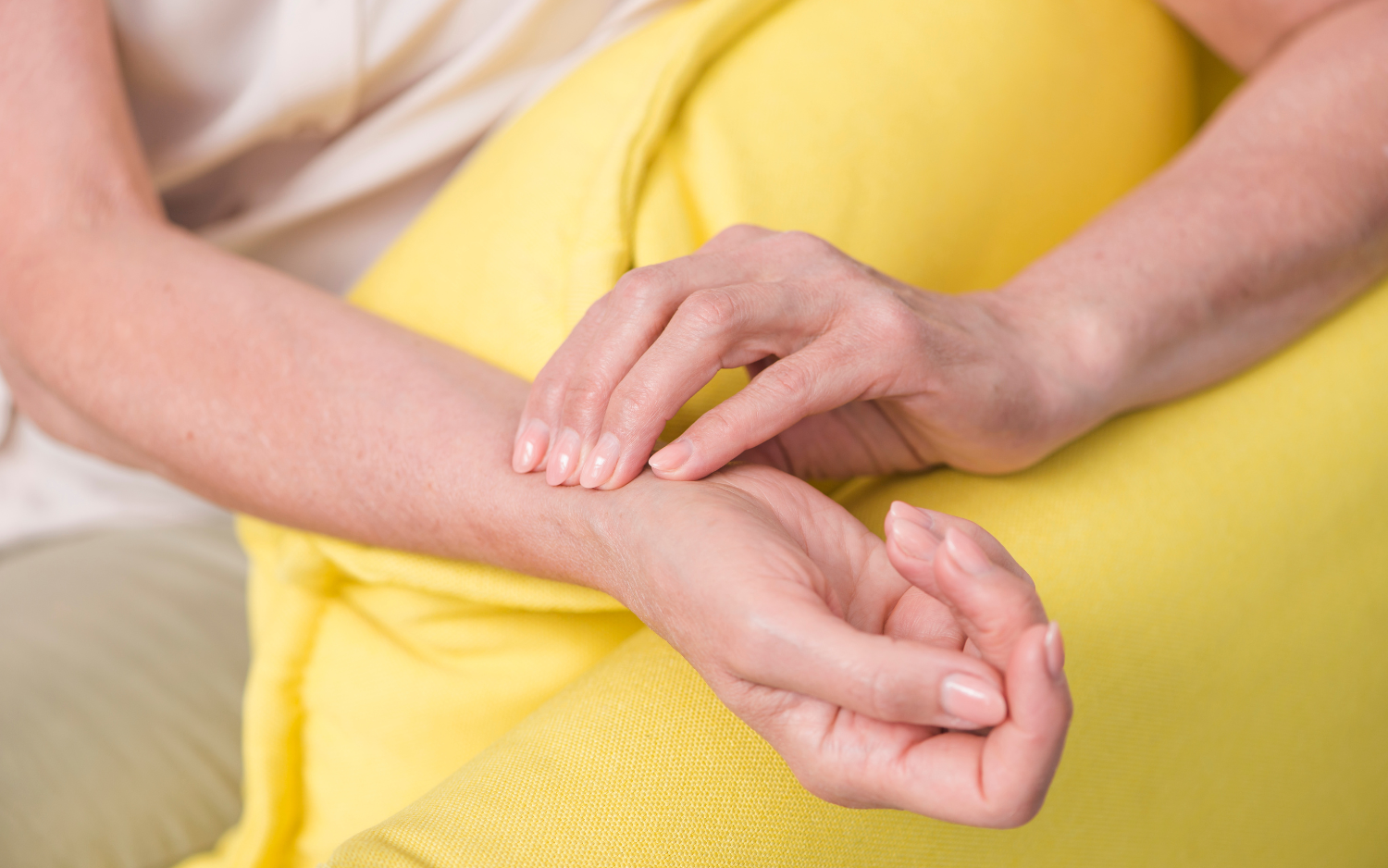 shows a person applying oil to their hands