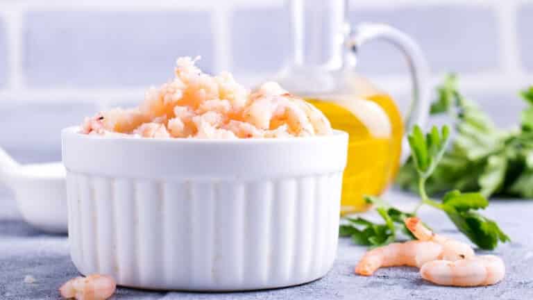 Krill meat arthritis natural relief: small bite with herbs, omega-3-rich, served in bowl.